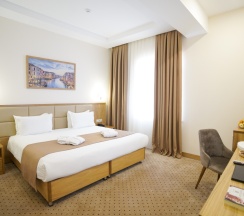 Двухместный люкс двуспальная кровать в Отель Milan Hotel Tashkent