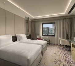 Двухместный номер Executive с видом на город 2 отдельные кровати в Kempinski Hotel Beijing Yansha Center