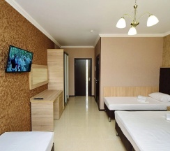 Четырёхместный номер Standard с балконом в AsTerias