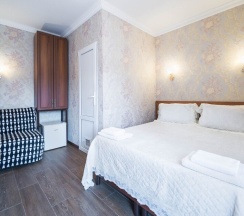 Двухместный номер с креслом кровать в Тих Отель