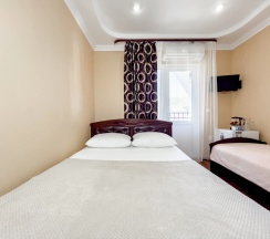 Четырёхместный номер Standard с балконом в Эксклюзив