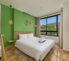 Семейные апартаменты с 2 комнатами с балконом в The Lago Apartments by Tropiclook