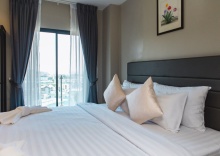 Четырёхместный номер Premium 2 отдельные кровати в Triple L Hotel Patong Beach