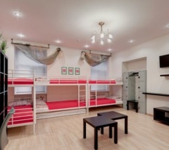 Кровать в 7-ми местном общем номере в Mini-Mani