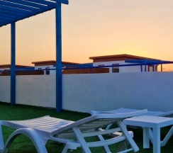 Двухуровневый ПОЛУЛЮКС с зоной отдыха на крыше в Santorini Family Club
