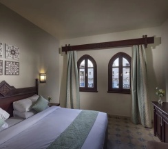Четырёхместная семейная студия c 1 комнатой с видом на бассейн в Mazar Resort & Spa
