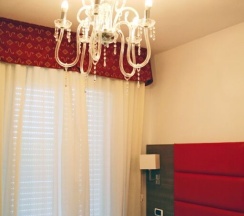 Четырёхместный номер Standard с балконом в Hotel Buratti