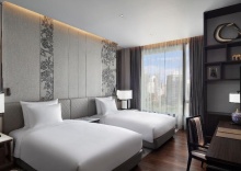 Двухместный номер Standard 2 отдельные кровати в Sindhorn Kempinski Hotel Bangkok