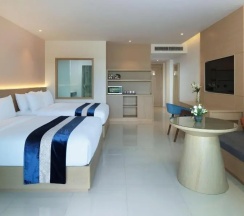 Двухместный номер Grand Deluxe с балконом 2 отдельные кровати в Chanalai Flora Resort, Kata Beach