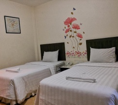 Двухместный номер Standard 2 отдельные кровати в Baan Suksiri Hotel