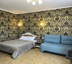 Четырёхместный семейный номер Superior с балконом и с красивым видом из окна в Morskoy priboy