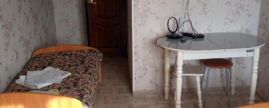 Кровать в 3-местном общем номере в Вираж