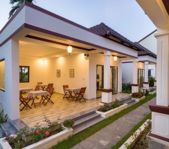 Двухместная студия Deluxe с балконом и с видом на сад 2 отдельные кровати в Hoi An Laughter Garden Villas