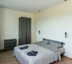 Четырёхместные апартаменты с 3 комнатами с балконом в Валентина