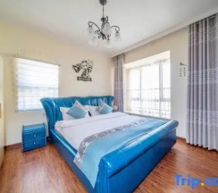 Семейный люкс в Yijiayi Holiday Hotel