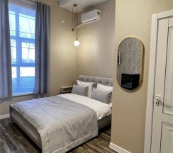 Улучшенный с двухспальной кроватью в Куликовъ