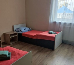 Кровать в 4-местном общем мужском номере в Порт 55