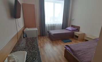 Кровать в 2-местном общем номере в Геолог