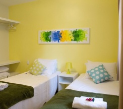 Двухместный люкс двуспальная кровать в Brazilodge All Suites Hostel