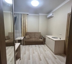 Четырёхместный номер Семейный с красивым видом из окна в Дом Гостей