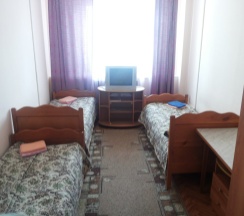 Кровать в общем номере в Цезарь