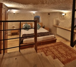 Двухместный люкс Cave Honeymoon двуспальная кровать в La Casa Cave