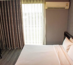 Двухместный номер Deluxe с видом на сад двуспальная кровать в Chor Cher - The Luxury Green Hotel