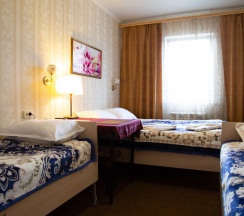 Номер комфорт с 4 односпальными кроватями в Home Hotel