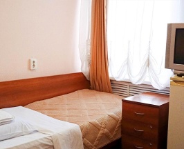 Кровать в 3-местном общем номере в Smart Hotel KDO Белгород