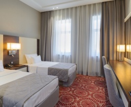 Двухместный номер Deluxe 2 отдельные кровати в Senator Hotel