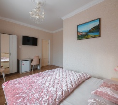 Комфортный улучшенный номер с двухспальной кроватью(King-size+) в Атмосфера