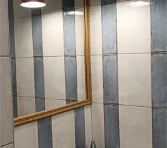 Апартаменты с большой кроватью, кухней-гостиной и отдельным входом в Двенадцать