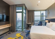 Двухместный клубный номер Standard с видом на город двуспальная кровать в Chatrium Hotel Riverside Bangkok