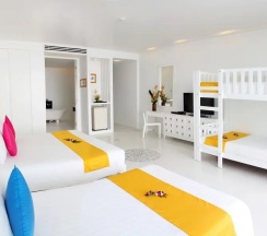 Номер Serene Wing Deluxe Family в Курортный отель The Old Phuket - Karon Beach Resort