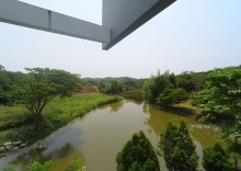 Люкс с балконом и с видом на воду в The Gallery Khao Yai Hotel and Residence