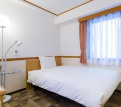 Одноместный номер Standard в Toyoko Inn Okinawa Naha Omoromachi Ekimae