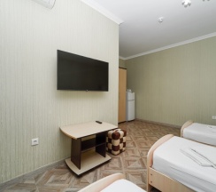 Четырёхместная комната с раздельными кроватями в Чайка