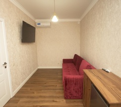 Номер люкс двухуровневый с 1 двуспальной кроватью в Пегас