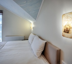 Двухместные апартаменты 18 Мансарда с видом на море двуспальная кровать в Exclusive Hotel&Apartments