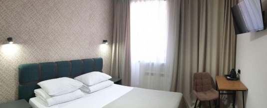 Номер стандарт с 1 двуспальной кроватью в Альпина