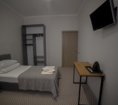 Номер эконом с 2 односпальными кроватями в Альпина