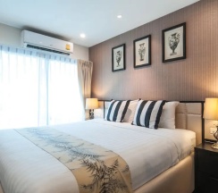 Двухместный номер Luxury с балконом двуспальная кровать в The Title KR Beach Condotel Rawai Phuket