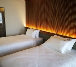 Двухместный номер Standard с балконом 2 отдельные кровати в Laekhon Nonbai Hotel