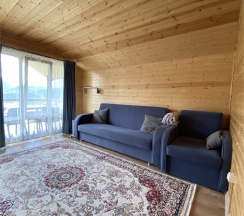 Лодж с вернадной и двумя односпальными кроватями в Arkhyz family lodge
