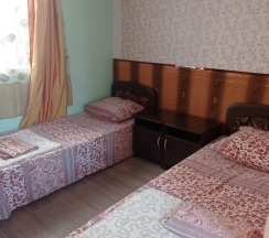 Комната стандарт с 3 односпальными кроватями в SunnyHouse