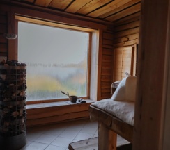 Двухместный коттедж с 3 комнатами с красивым видом из окна двуспальная кровать в Банный остров
