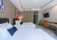 Трёхместный номер Deluxe pool view в Aranta Suvarnabhumi