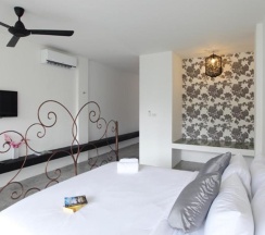 Двухместный номер Deluxe с балконом двуспальная кровать в Surintra Boutique Resort