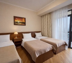 Корпус №5 Трехместный стандарт с балконом (три односпальные кровати) в Беларусь