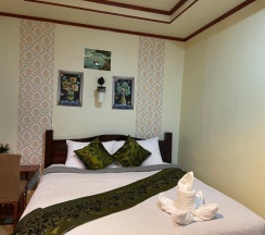 Двухместный номер Standard с видом на сад двуспальная кровать в Starlight Haad Rin Resort